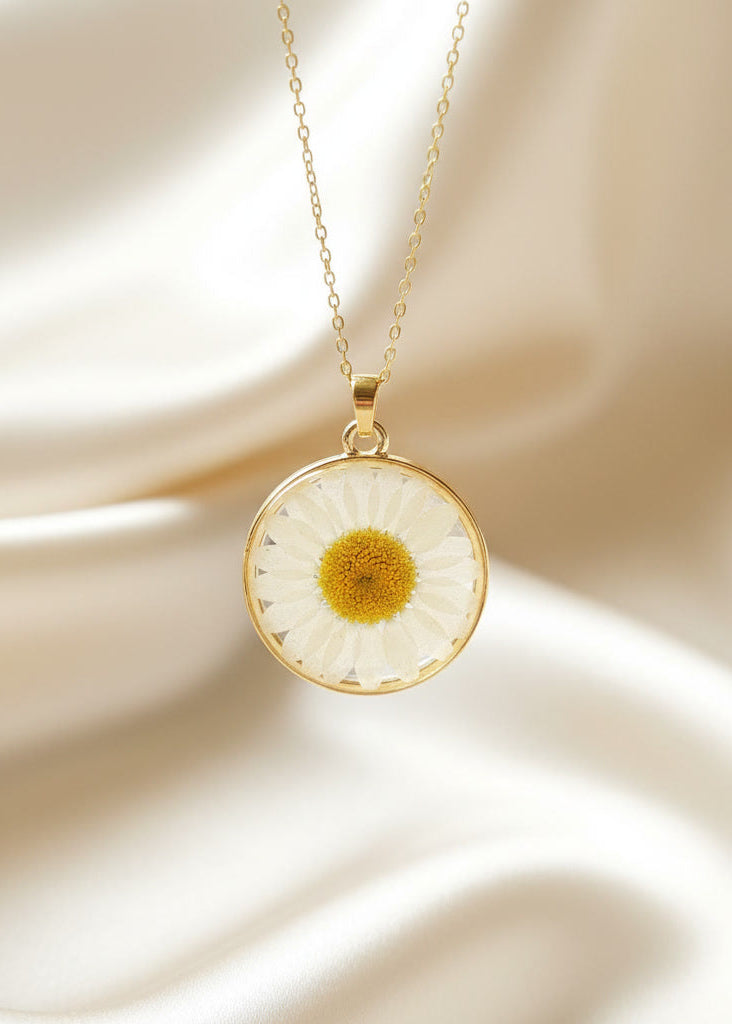 Resin daisy flower necklace with a real pressed white daisy in a clear pendant